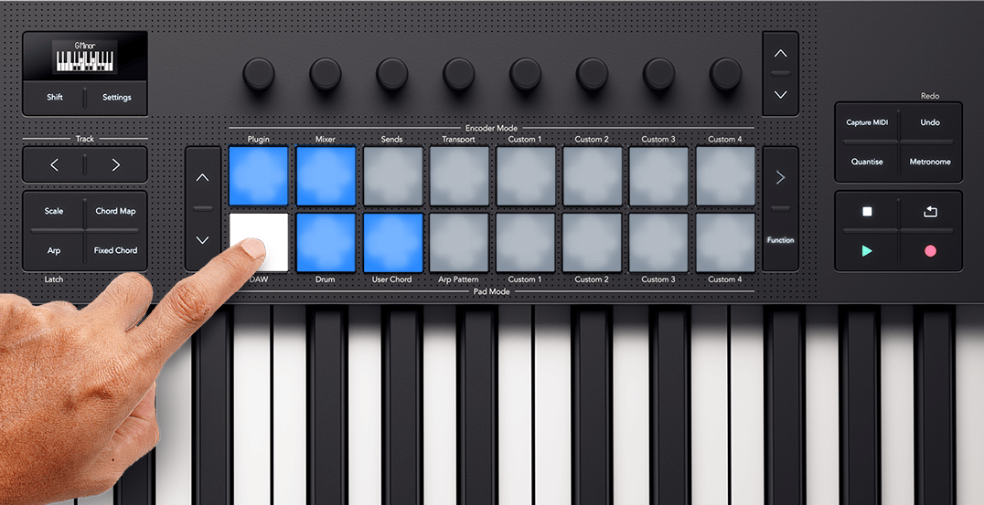 Five pads lit showing user guides assigned to them with a user playing a chord pad, lit green.